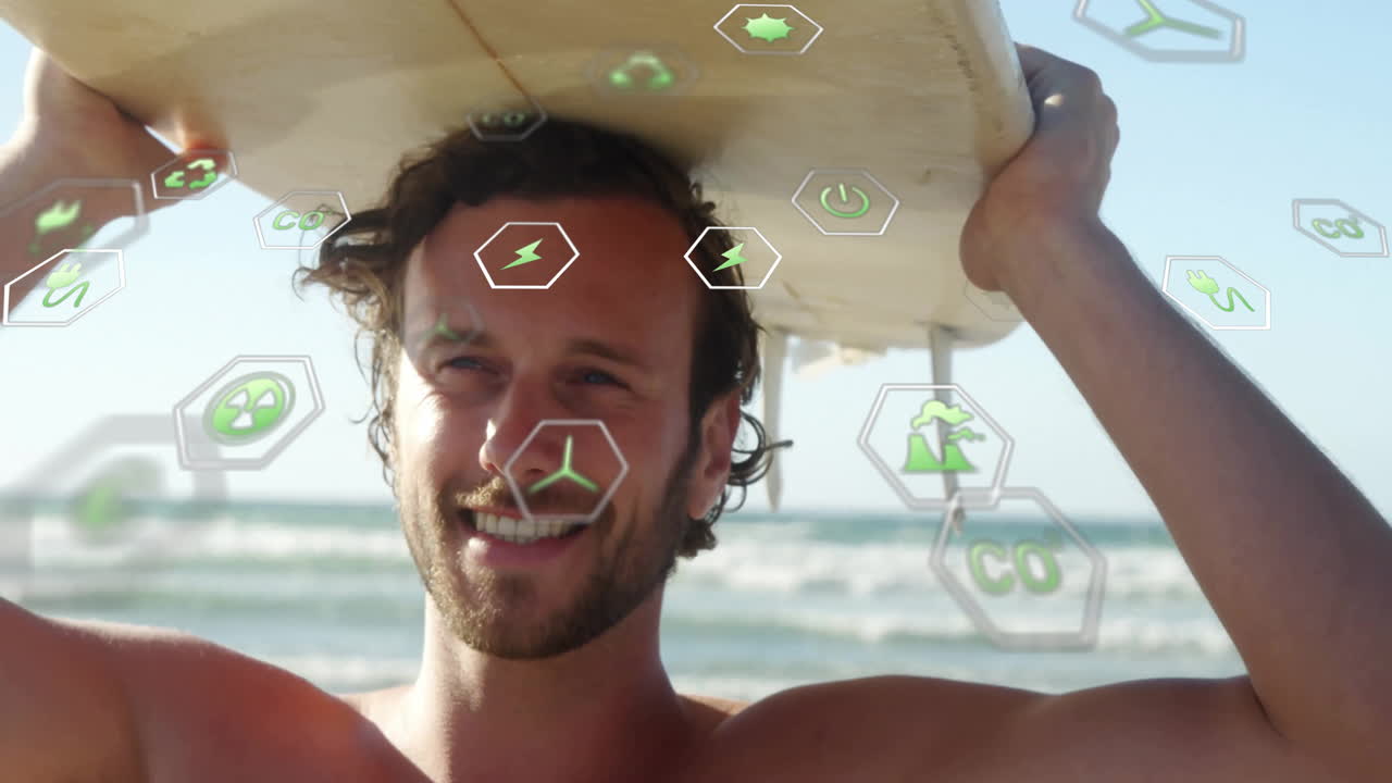 Surfer holding surfboard overhead, showing renewable energy technology icons floating around