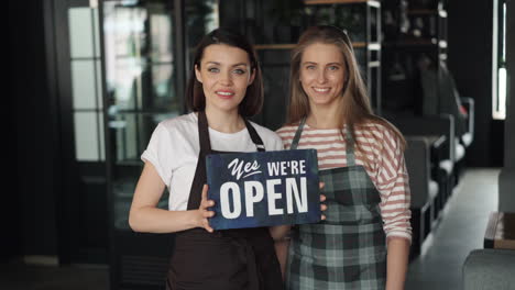 Restaurant Staff Welcoming Customers