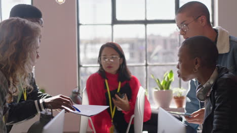 young-group-of-business-people-meeting-discussing-marketing-research-brainstorming-ideas-planning-deadline-strategy-creative-team-collaborating-in-multi-ethnic-startup-office