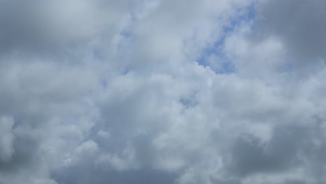 Cumulonimbus-clouds-forming-close-up-on-bight-summer-day