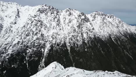 Hiking-along-snowcapped-peaks-in-the-Tatras-Mountains-in-Morskie-Oko-Park-in-Zakopane-Poland