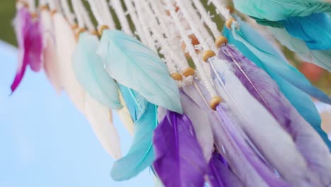 colorful dreamcatcher with feathers