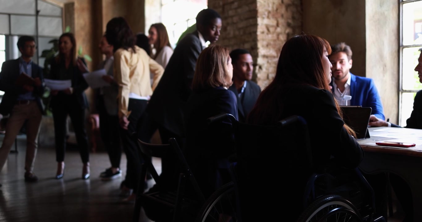 Diverse Business Team Collaborating in Modern Office Meeting