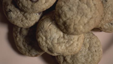 Delicious-Cookies-In-A-Plate-Rotating-On-The-Table---Close-Up-Shot