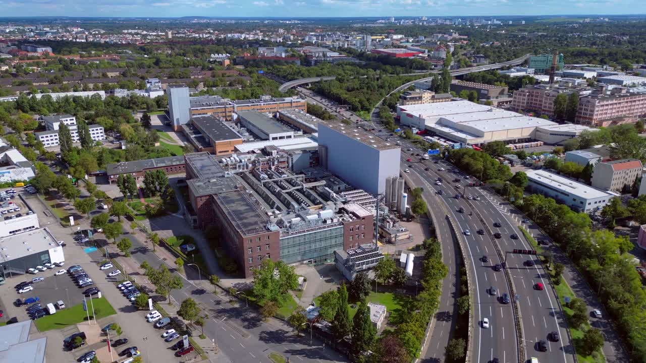 Aerial view of cityscape with highways and buildings