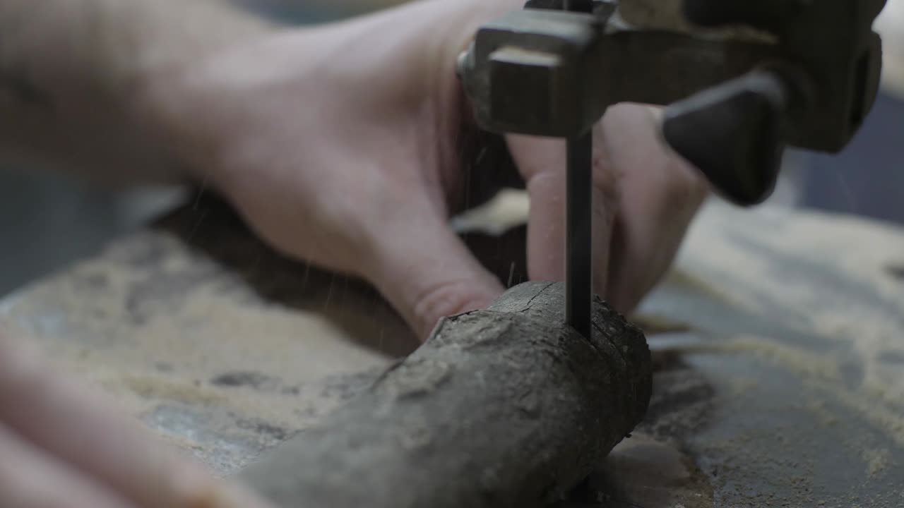 Wood being cut on a bandsaw