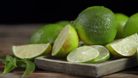 lime on a wooden cutting board rotates slowly.