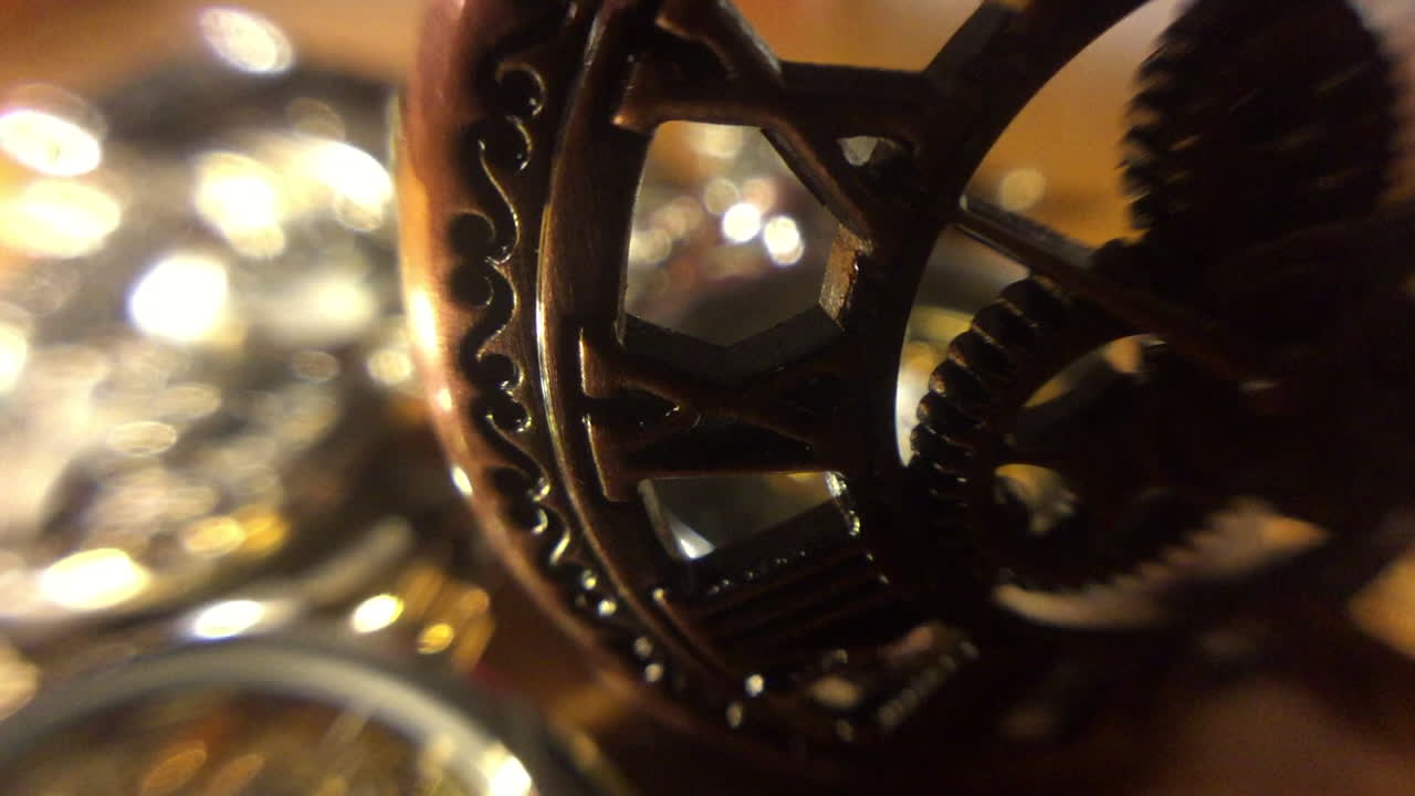 Ornate Pocket watch case with roman numerals is revealed out of shadows