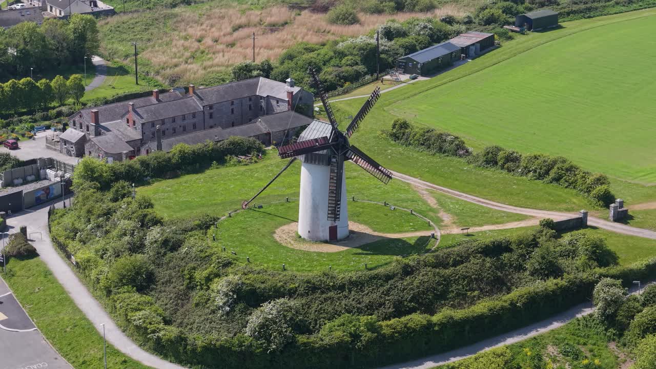Aerial view of Skerries Mills, 12th-century flour complex in lush greenery
