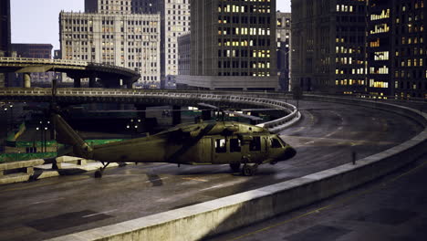 military helicopter on urban highway during nighttime operation