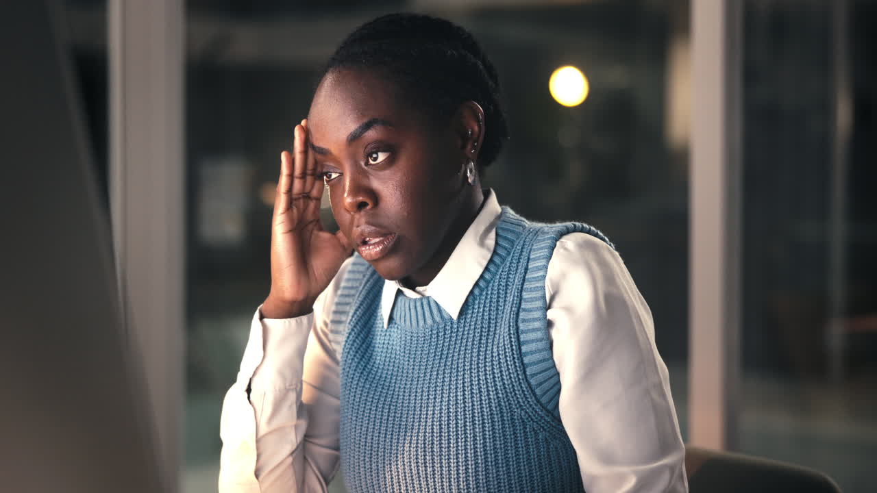 Stressed Young Businesswoman Suffering from Headache While Working Late in Office