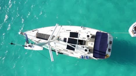 Mast-Of-Sailboat-Swaying-While-Cruising-On-The-Coast-Of-The-Bahamas-In-Caribbean