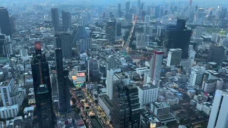aerial bangkok city thailand no horizon skyscrapers twilight sprawling metropolis. buildings over financial business district downtown.