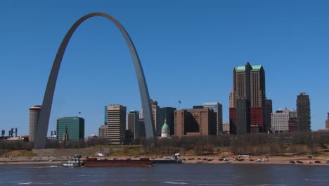 a barge travels on the mississippi river near st louis 1