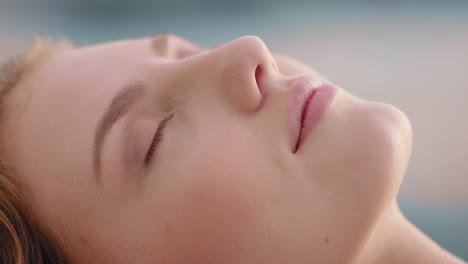 close up portrait beautiful woman lying on grass in peaceful countryside enjoying summer vacation relaxing in nature