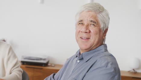 Portrait-of-happy-senior-diverse-people-having-dinner-at-retirement-home