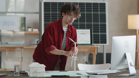 male engineer discussing project of renewable energy on video call