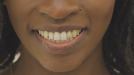 cropped shot of smiling female face.