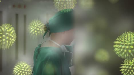 animación de la propagación del coronavirus covid19 con un trabajador de la salud en el fondo