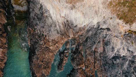 aerial drone top view of cliffs and ocean