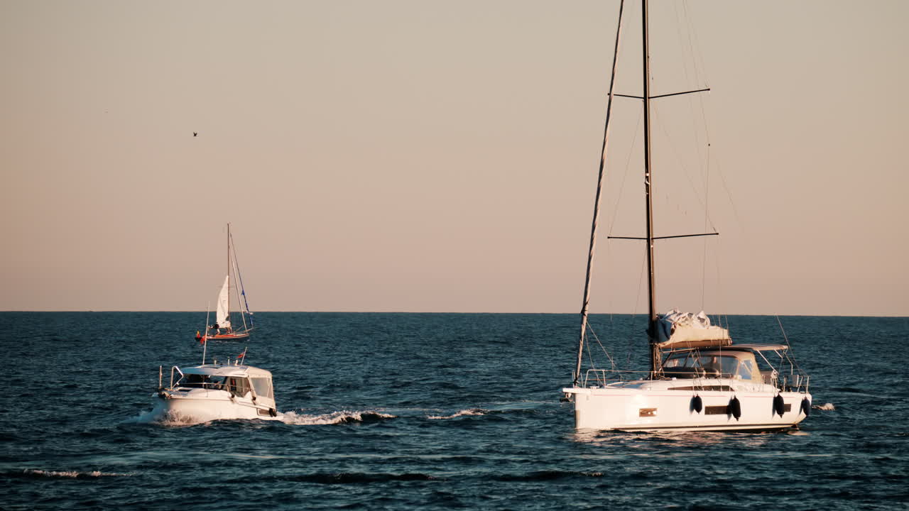 White boats moving on the sea in Golfe-Juan, France