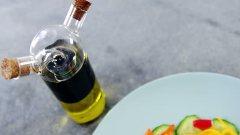 salad with oil on plate