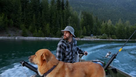 fishermen travelling with his dog in the boat 4k