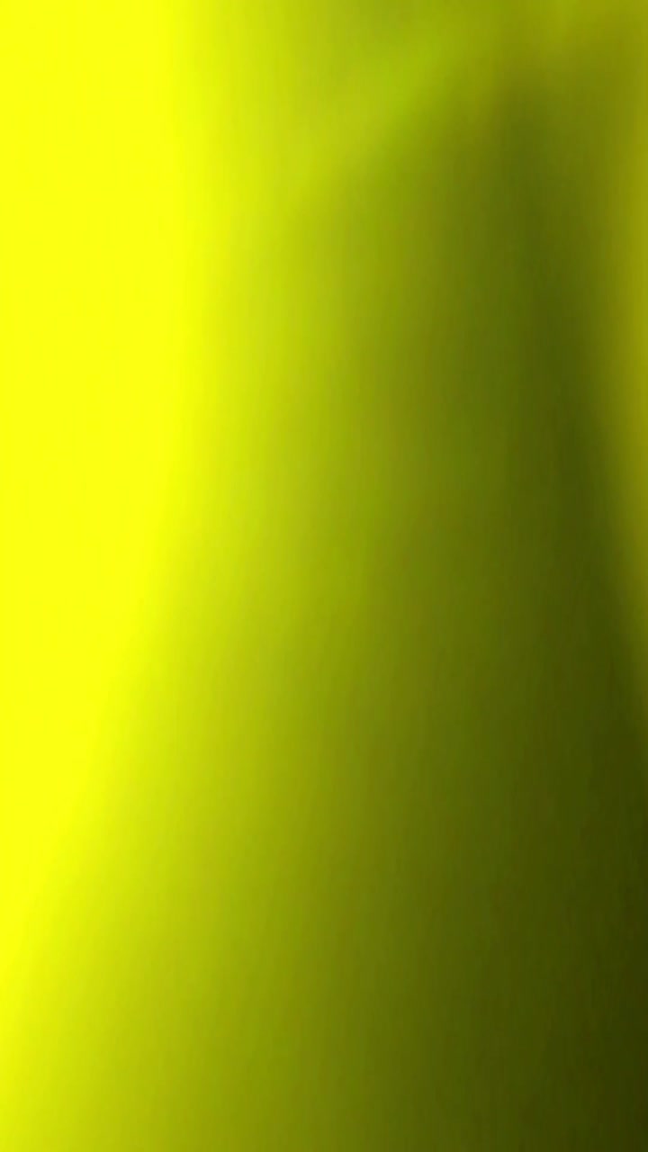 Abstract Light Leaks with Green and Yellow Color Transition