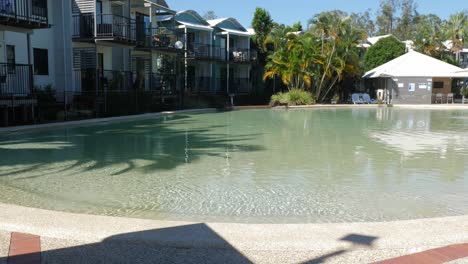 empty swimming pool at noosa lakes resort during covid-19 - holiday resort and accommodation in qld, australia