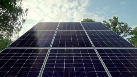 Blue-photovoltaic-solar-panels-are-mounted-to-produce-clean-ecological-electricity-at-sunset