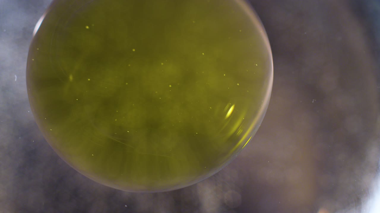 Abstract liquid yellow orb bubble floating background texture