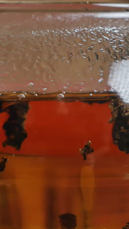 close-up of tea in a glass teapot