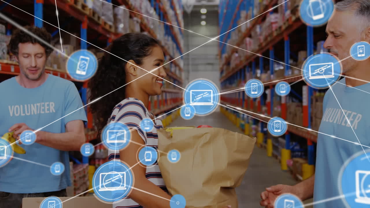 animación de una red de iconos digitales sobre una mujer biracial dando algunos bienes a un voluntario masculino.