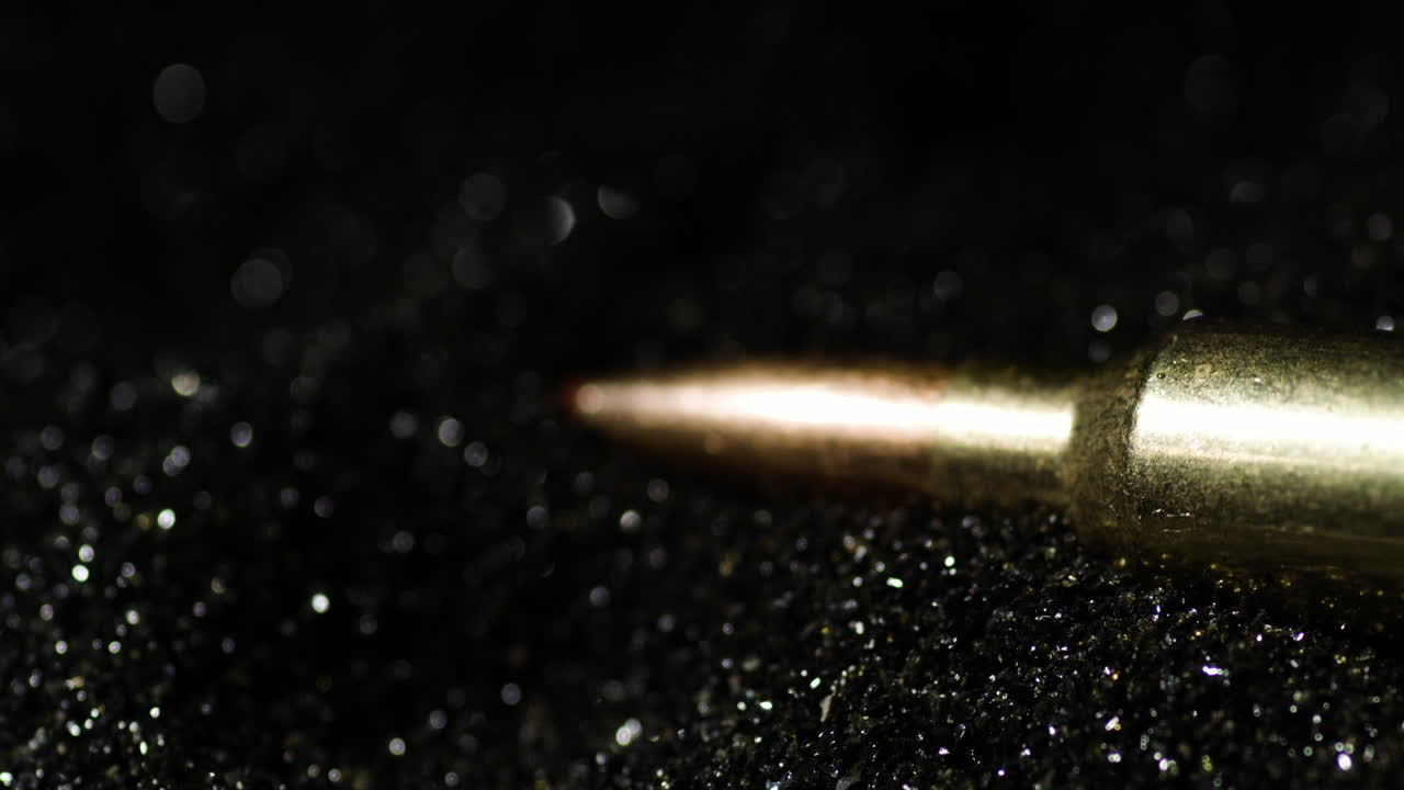 Aerodynamic Bullets Of 6mm ARC Heap Over Glistening Grains Of Gunpowder