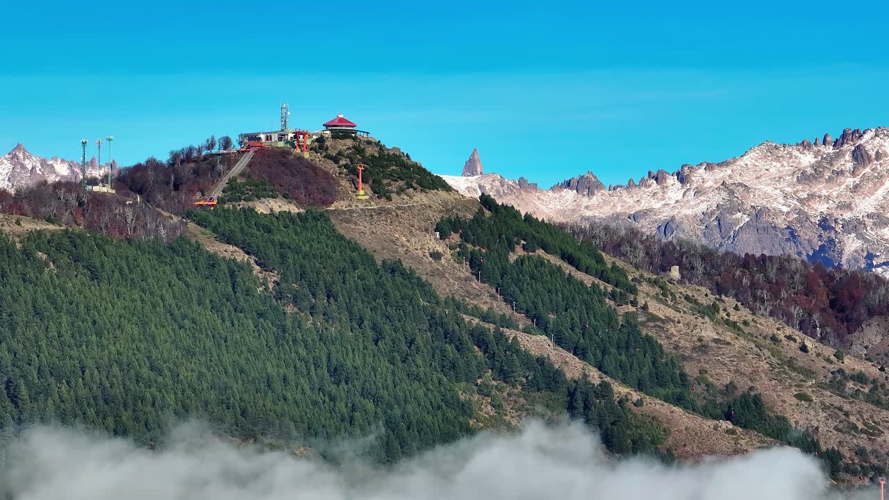 Aerial View Of Cerro Otto Restaurant On Hilltop At San Carlos de Bariloche. Dolly Right Establishing Shot