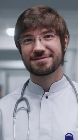 caucasian physician in glasses stands in middle of 4k 2025 07 22 09 56 34 utc.mov | appointment, assistance, care, caucasian
