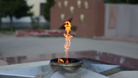 eternal flame at a war memorial