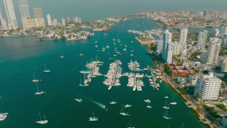 aerial shot of a lot of boats sailing to the ocean in the parking boat, marina, cartagena, colombia