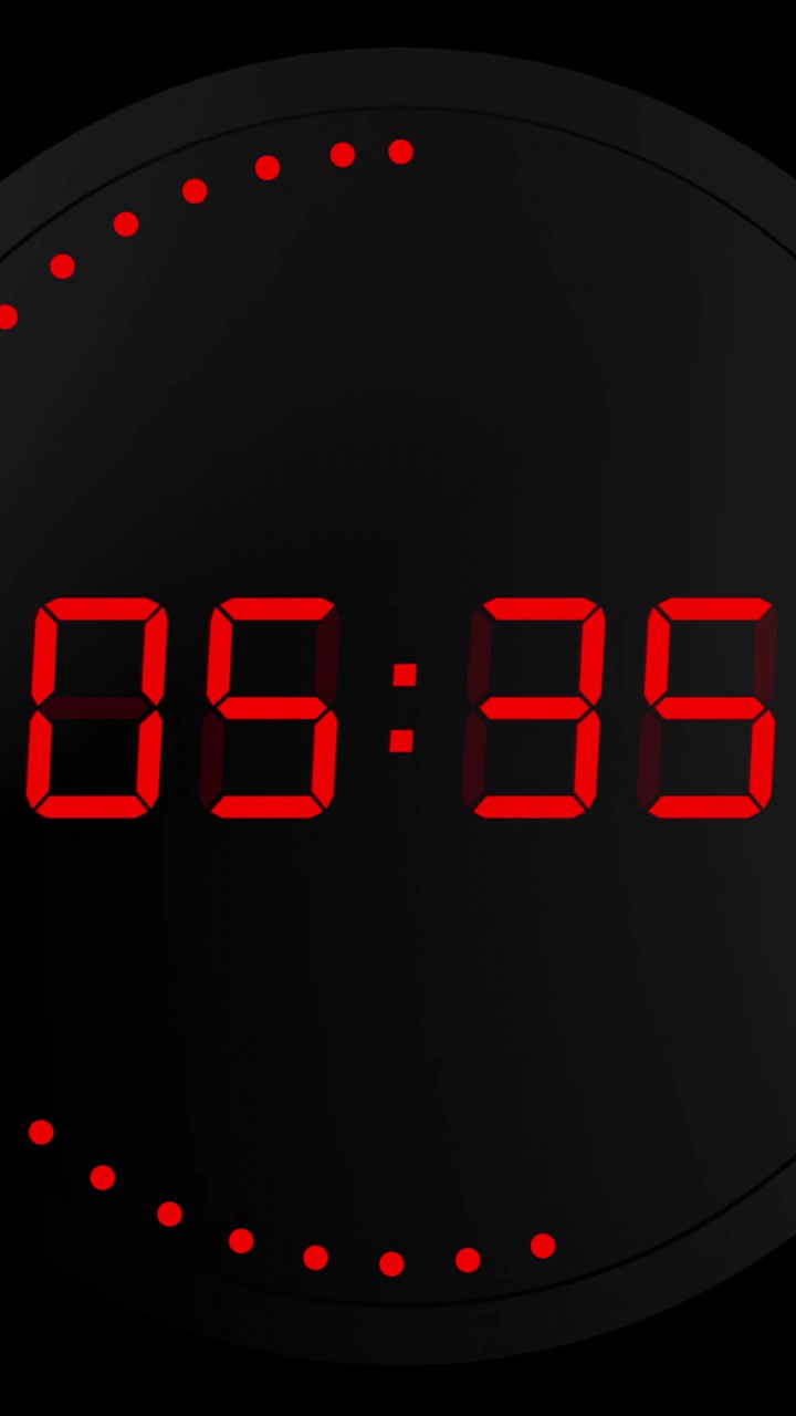 Animation of red digital timer changing with dots in circle on black background
