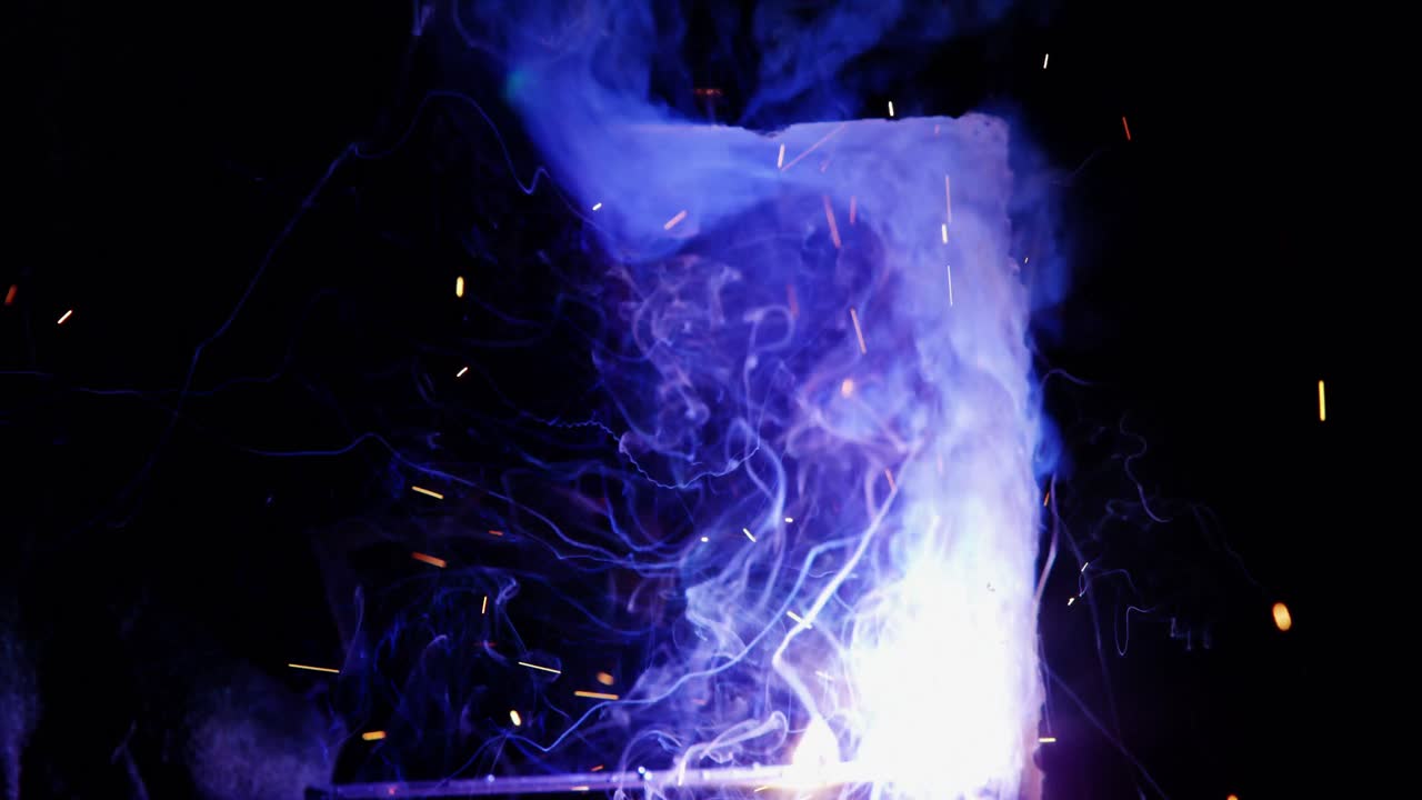 Welder welding a metal