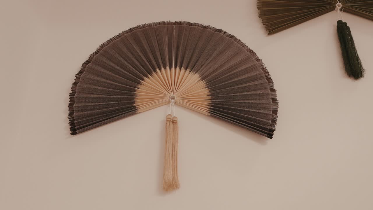 Graceful handmade fan decor exudes timeless charm and peace