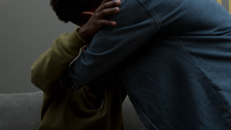 mixed-race man greeting his friends