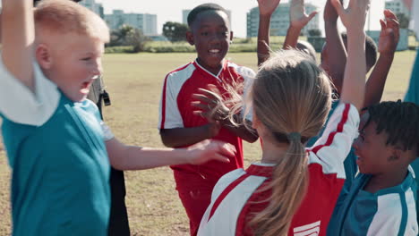youth soccer team celebrating a win