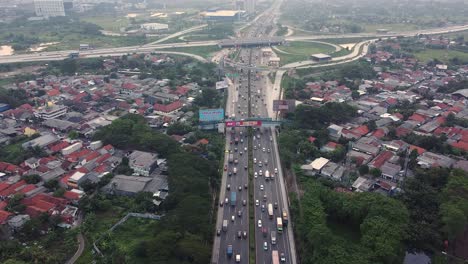 aerial drone shot, highway crossing traffic timelapse