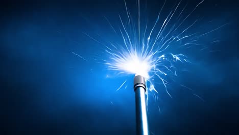 closeup of a spark plug sparking with electricity