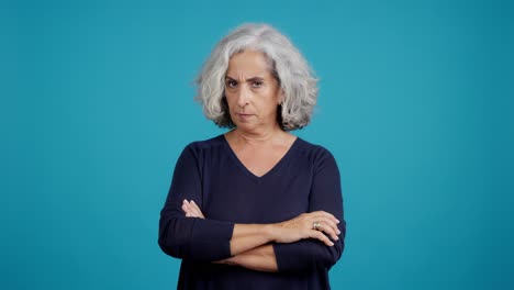 senior woman with arms crossed