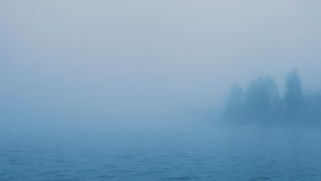 misty morning over a lake