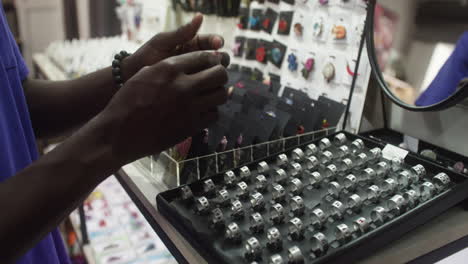 close up view of young man hands in a store