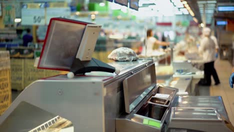 employees of the store are behind the counter