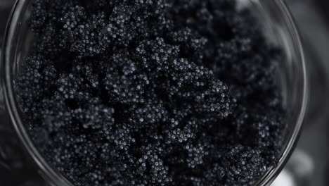 seamless loopable rotating black caviar (close-up)